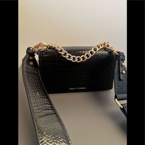 Mini bag ( can fit a card holder and phone depending on size)